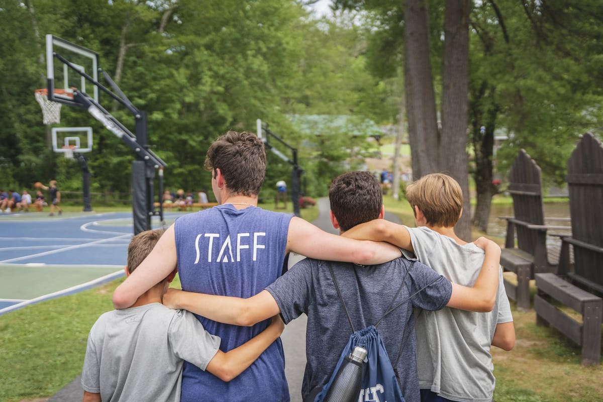 Staff and campers enjoying outdoor activities