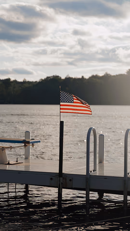 Staff member with campers at summer camp